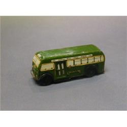 A tin plate clock work Green Line single decker bus