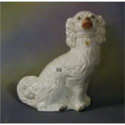 A 19th Century Staffordshire figure of a seated Spaniel 12 