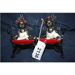 Pair of Black Babies on Park Bench