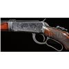 Image 3 : *EXTREMELY RARE DELUXE ENGRAVED & GOLD INLAID TAKEDOWN WINCHESTER MODEL 1894 LEVER ACTION RIFLE.