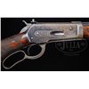 Image 4 : *SCARCE ENGRAVED DELUXE WINCHESTER MODEL 1886 EXTRA-LIGHT TAKEDOWN LEVER ACTION RIFLE.
