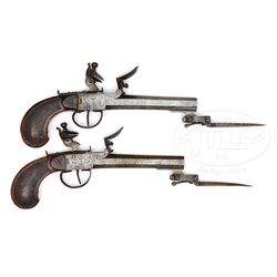 PAIR OF BELGIAN FLINTLOCK BOXLOCK PISTOLS WITH SPRING-LOADED BAYONETS.