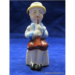 Sitting Man Playing Horn