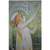 Image 1 : Woman holding up a glass of absinthe