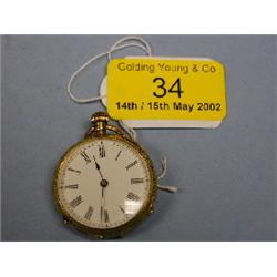 A Swiss gold cased open face lady's fob watch, case engraved with  floral and scrolling motifs w