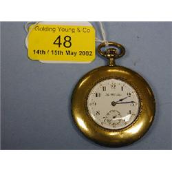 A gold plated slim open faced dress pocket watch with enamel dial  having Arabic numerals, subsi