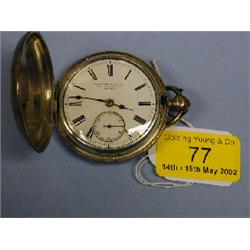 A silver hunter pocket watch, white enamel dial, Roman numerals,  subsidiary second hand, signed