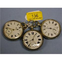 Three silver cased open face pocket watches.