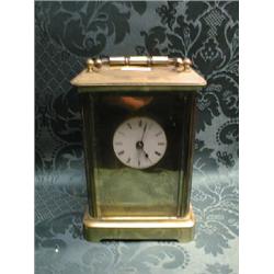 A late 19thC. brass cased carriage timepiece by Brevete, Paris, the  enamel dial with Roman numer