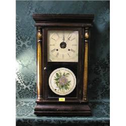 A mid-19thC. American mahogany shelf clock with 8-day movement  striking a gong and labelled Seth