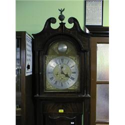 A Georgian oak and flamed mahogany veneered longcase clock with  swan-neck ball and eagle spike p