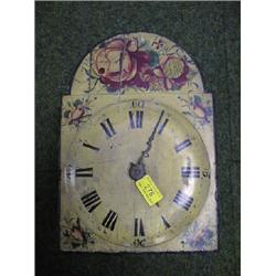 A 19thC. continental wall clock with painted and moulded square arch  dial, 13" high, 9" wide.