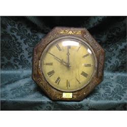 A Victorian rosewood octagonal wall clock with brass inlaid case and  painted dial.  (AF)