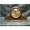 Image 1 : A 1930's Napoleon's hat oak mantel clock with 8-day movement striking  on a gong.