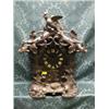 Image 1 : A 19thC. Black Forest mantel clock with traditional rustic and  foliate carved case and having cu