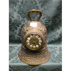 A 19thC. bronze table clock in the form of a bell, having gilt metal  and enamel tablet dial, Fre