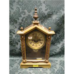A 19thC. German alarum mantel clock with 8-day movement striking on a  bell, 16".