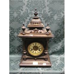 A similar clock bearing the label 'The Grenwich' Clock No 11777,  manufactured in Wurtenberg for