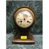 Image 1 : An Edwardian string inlaid mahogany balloon mantel clock on brass  feet, and having convex enamel