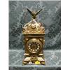 Image 1 : A late 19thC. brass table clock surmounted with an eagle over a  baroque style case with sunburst