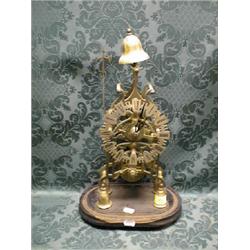 A late 19thC. brass skeleton clock having 6" silvered and pierced  chapter ring with Roman numera