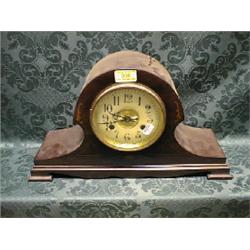 An Edwardian mahogany marquetry Napoleon's hat mantel clock with  cream enamel dial and 8-day mov