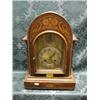 Image 1 : An Edwardian mahogany and marquetry bracket clock with brass arch  dial having silvered chapter a