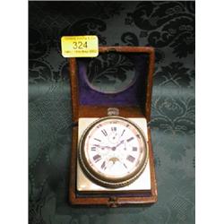 A continental gilt metal and blue enamel clock garniture, the  circular dial with Roman numerals