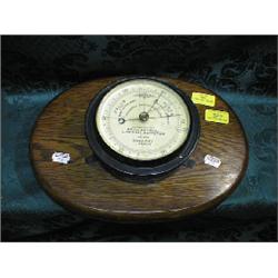 A Fisherman's aneroid barometer by Dolland, London, No 2046, issued  by the Royal National Lifebo