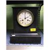 Image 1 : A 19thC. slate mantel clock with enamel dial, 8-day movement striking  a bell, 10" high.