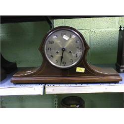 An Edwardian string inlaid mahogany Napolean's hat mantel clock with  8-day movement striking a g