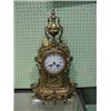 Image 1 : A late 19thC. French gilt metal mantel clock, with a white enamel  circular dial, Roman numerals