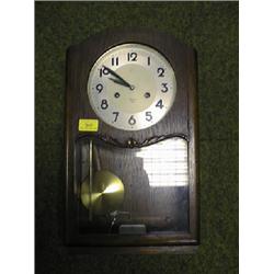 A 1930's oak wall clock, the dial marked Hopper, Boston.