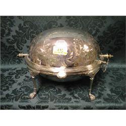An electroplate dome top serving dish on column legs with paw feet  and bright cut foliate decora
