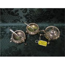 A George V silver mustard, oval, with reeded borders and scroll  handle, the domed cover with aco