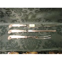 A silver 7-bar toast rack, with acanthus and shell cast loop handle,  on shell scroll feet, Sheff