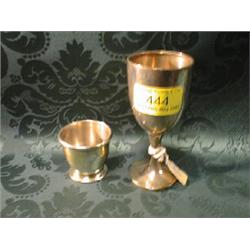 A George V silver trophy cup, on knopped stem, Chester 1928, 4 1/2"  high, another with 2 loop ha