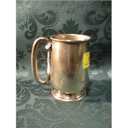 A Geroge V silver mug, of straight sided bellied form, with loop  handle, Chester 1929, 3 1/2" hi