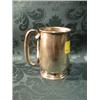 Image 1 : A Geroge V silver mug, of straight sided bellied form, with loop  handle, Chester 1929, 3 1/2" hi