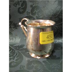 A George V silver mug, with scroll handle, Birmingham 1924, 3" high,  3ozs.
