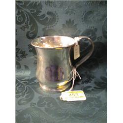A George V silver baluster mug, with scroll handle, Chester 1913, 3  1/2" high, 5ozs.