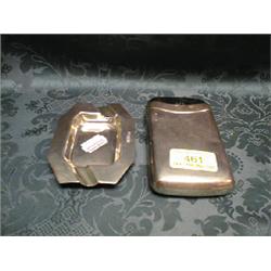 An Edward VII silver cigar case with leather sleeve, Chester 1902, 5 , together with a silver ash