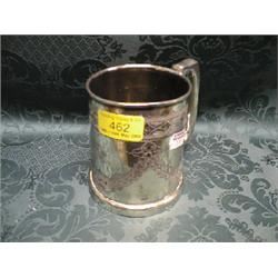 A Britannia metal tankard by Atkin Brothers, engraved with a broad  geometric band and floral swa