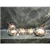 Image 1 : A 4-piece planished silver tea service of compressed circular  outline, the teapot spout moulded