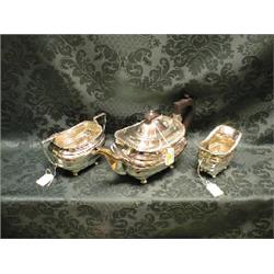 A George V silver 3-piece tea service, by Walker & Hall, of boat  shape, with gadroon moulding to
