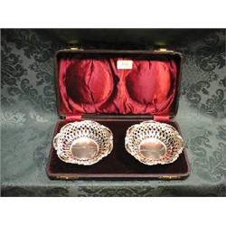 A pair of Edward VII silver sweetmeat dishes, by M Matthews, of  circular form, with diamond pier