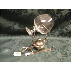 A Mappin & Webb EPNS brandy warmer, the burner and glass supported on  a base modelled as a pair