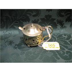 An Edward VII silver mustard, Birmingham 1905, the circular body  pierced with poppies and leafag