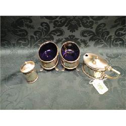 A silver 4-piece cruet set, of Adam design, Birmingham 1924/1925,  oval, with bead borders, pierc