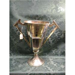 An Indian silver 2-handled racing trophy, of hexagonal tapering shape, on domed circular foot, in